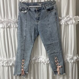 Stylish Blue Jeans with Pink Lace-Up Detail